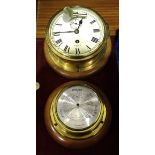 A Smiths Astral brass bulkhead ship's clock, 18cm diameter, (glass bezel loose), on wooden