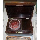 A 19th century rosewood tea caddy with interior cannister and glass mixing bowl, fitted with ring