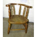 A child's elm and beech captain's-style chair, 44.5cm high.