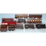 Trix OO gauge, four unboxed locomotives, three coaches, a boxed 675 bogie brick wagon, seven other