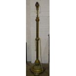 An early-20th century brass telescopic oil lamp stand with reeded column, on circular base, (