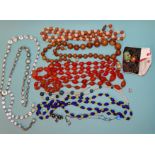 A white paste sautoir necklace, two agate bead necklaces and other mainly bead necklaces.