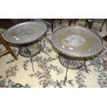 A pair of low wire-work stands with undertier fitted with two metal Benares trays, 56cm diameter,