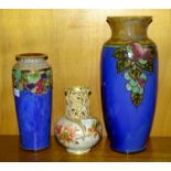 A Royal Doulton stoneware cylindrical shape vase by Minnie Webb, tubelined with fruit and leaves