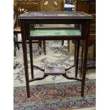 An Edwardian cross-banded mahogany glazed bijouterie table with bevelled glazed panels, on square