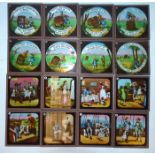 A collection of vintage magic lantern slides, including 'Uncle Tom's Cabin' (24), 'The Tiger and the