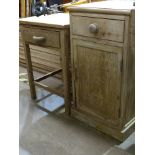 A stripped pine pot cupboard with drawer and cupboard door, 40cm wide, another with a single