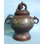 A 19th century Chinese bronze and cloisonné incense pot of bellied form, with elephant handles and