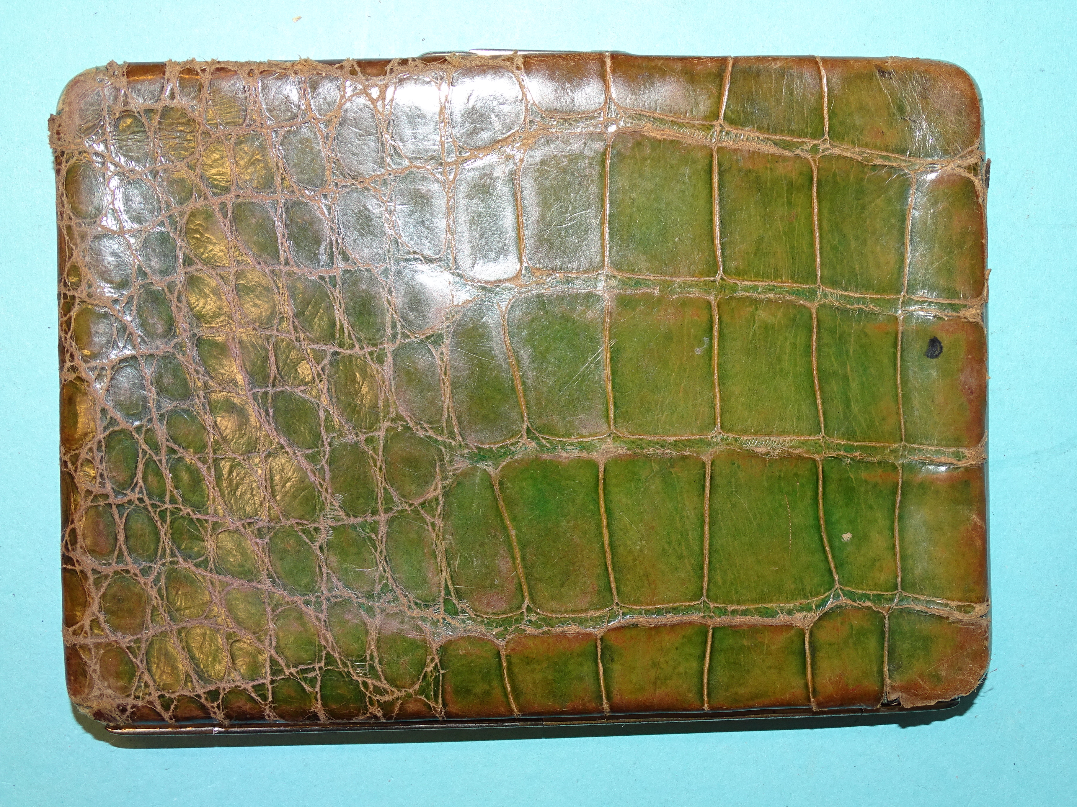 An Art Nouveau silver-mounted green crocodile skin wallet, Birmingham 1900, 14 x 10cm. - Image 3 of 5