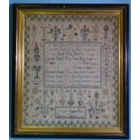 A Victorian sampler by Gertrude Bickle, aged 16, listing her family's birthdates 1817-1864, within a