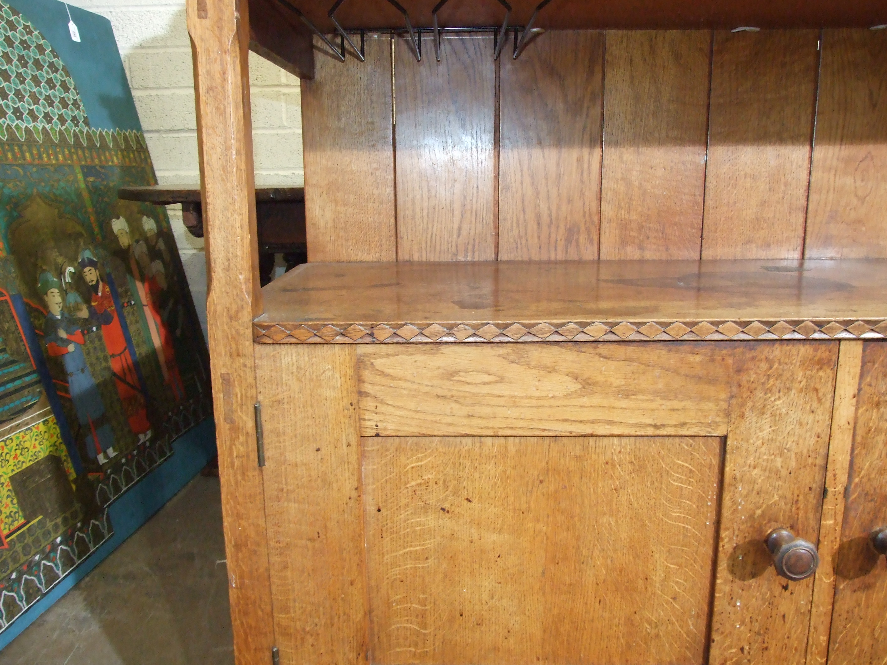 An early-20th century Arts & Crafts oak dining table, the plank top above a single frieze drawer, on - Image 6 of 10