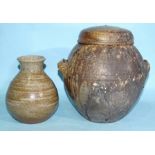 A studio pottery two-handled storage jar and cover, 24cm high and a studio pottery vase incised 'GE'