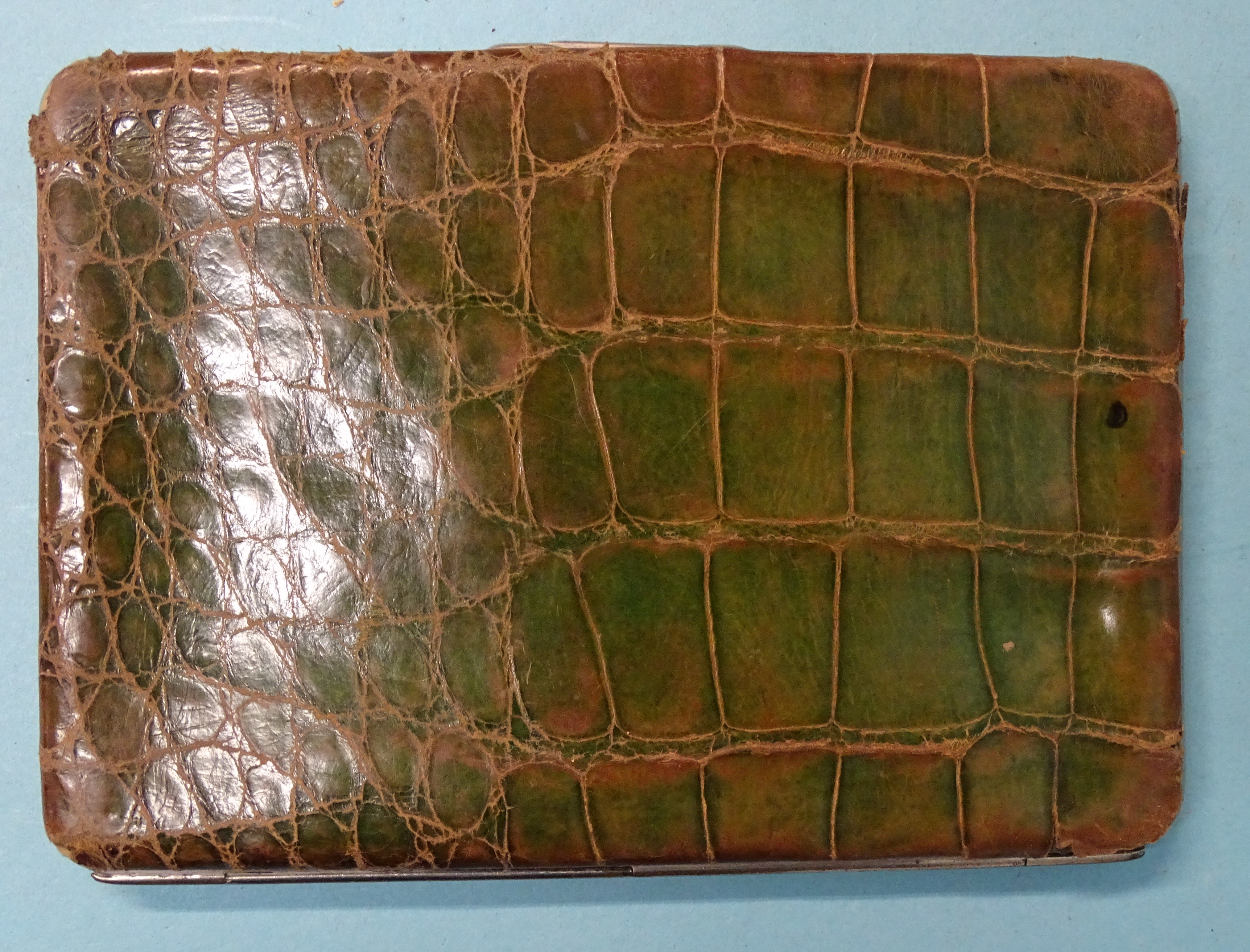An Art Nouveau silver-mounted green crocodile skin wallet, Birmingham 1900, 14 x 10cm. - Image 4 of 5