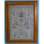 An early-19th century sampler by Louisa Gandy, 1811, with verse, castle, trees, flowers, animals and