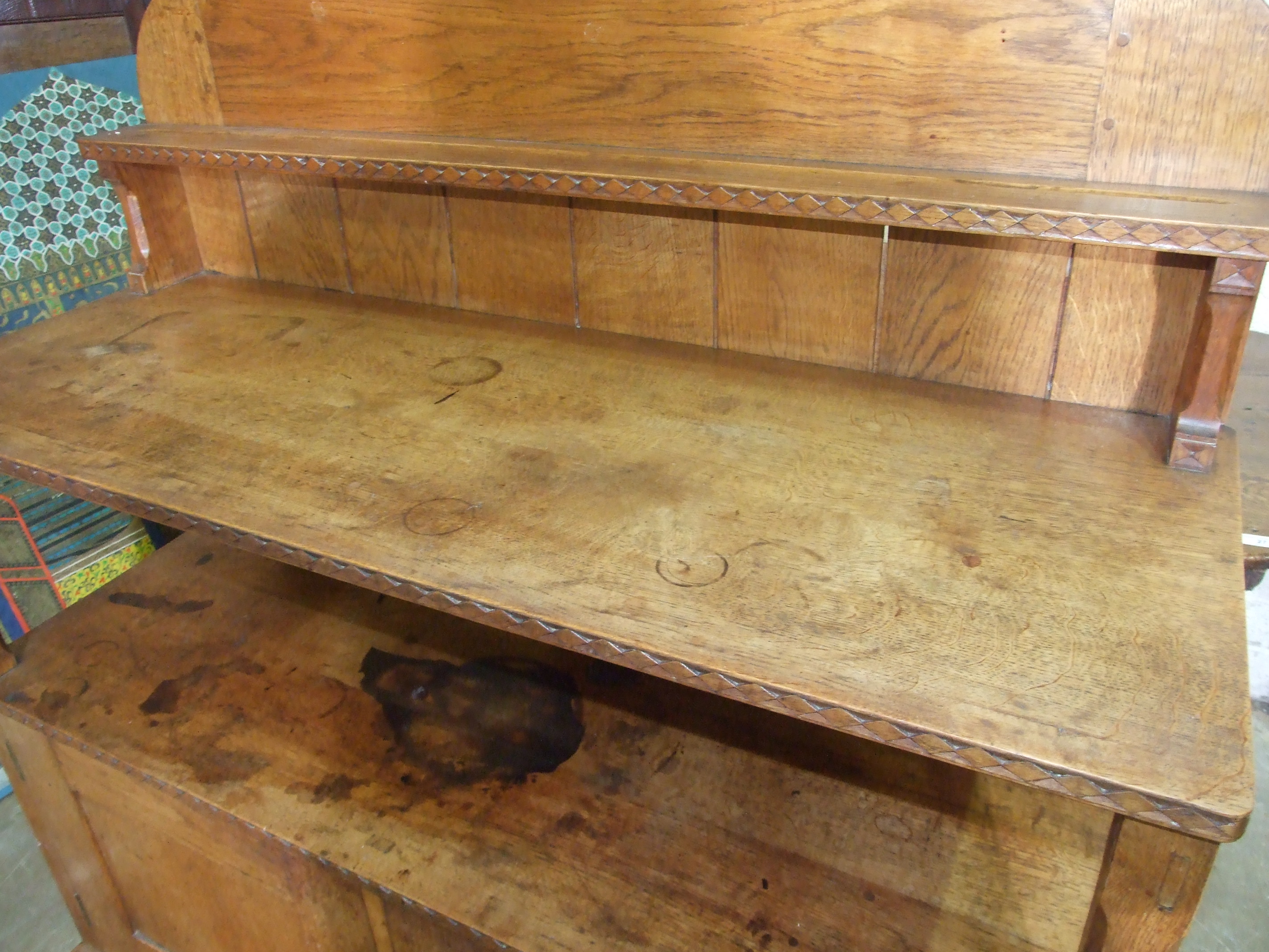 An early-20th century Arts & Crafts oak dining table, the plank top above a single frieze drawer, on - Image 9 of 10
