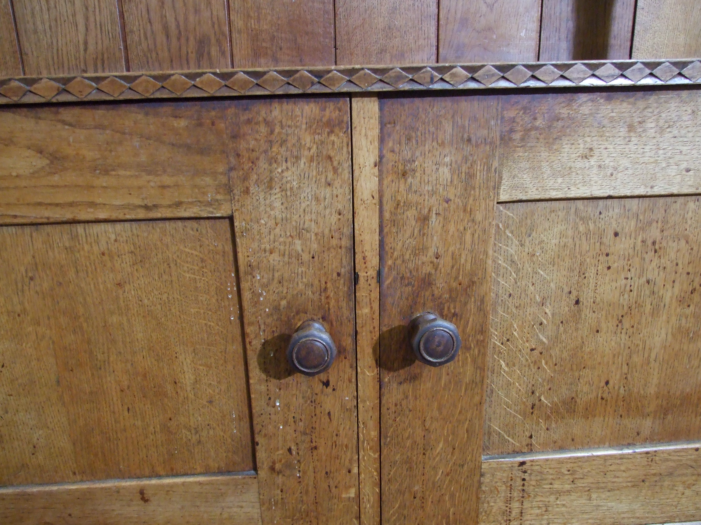An early-20th century Arts & Crafts oak dining table, the plank top above a single frieze drawer, on - Image 7 of 10