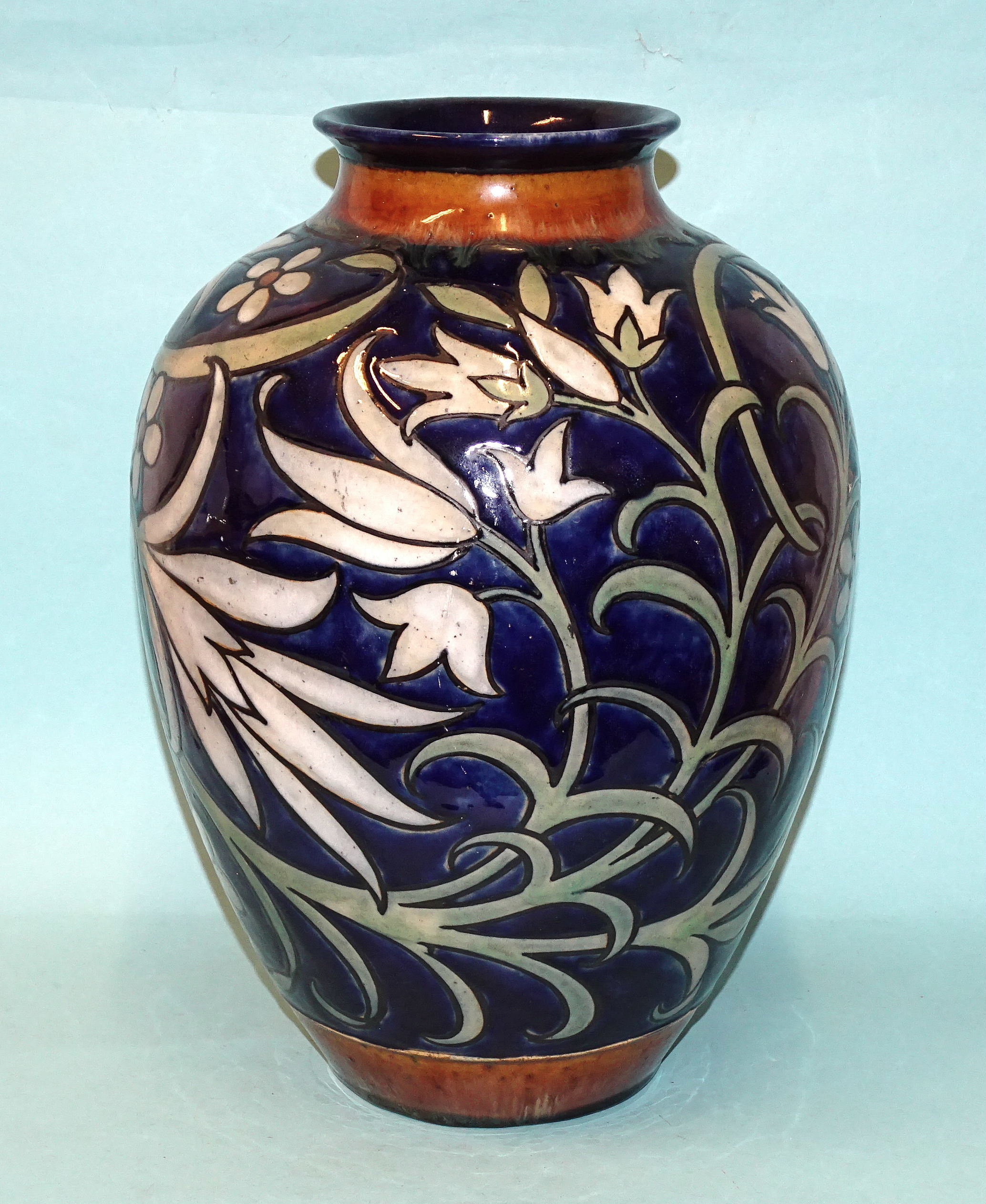 A Royal Doulton stoneware baluster-shaped vase by Harry Simeon, with stylised floral and leaf - Image 2 of 4
