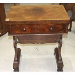 An early-19th century rosewood games and worktable, the rectangular fold-over top with inlaid