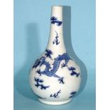 A small blue and white bottle-shaped 'dragon' vase, (chipped), 15cm high.