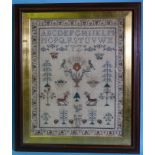 A 19th century sampler by E W, 1830, with alphabet, flowers, fruit, stags, birds, butterflies and