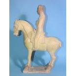 A Chinese Tang Dynasty-style pottery figure of a horse and rider, 33cm high.