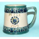 Arthur Lasenby Liberty and William Moorcroft, a commemorative 1919 'Peace' mug, impressed maker's