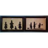 A pair of 19th century silhouettes, family groups, the first depicting a central female figure