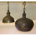 A large Egyptian pierced metal hanging light bowl with extension hook, 70cm high approximately, 46cm