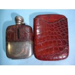 A crocodile skin cigar case, 15.5 x 11.5cm (closed) and a silver-plated and crocodile skin-mounted