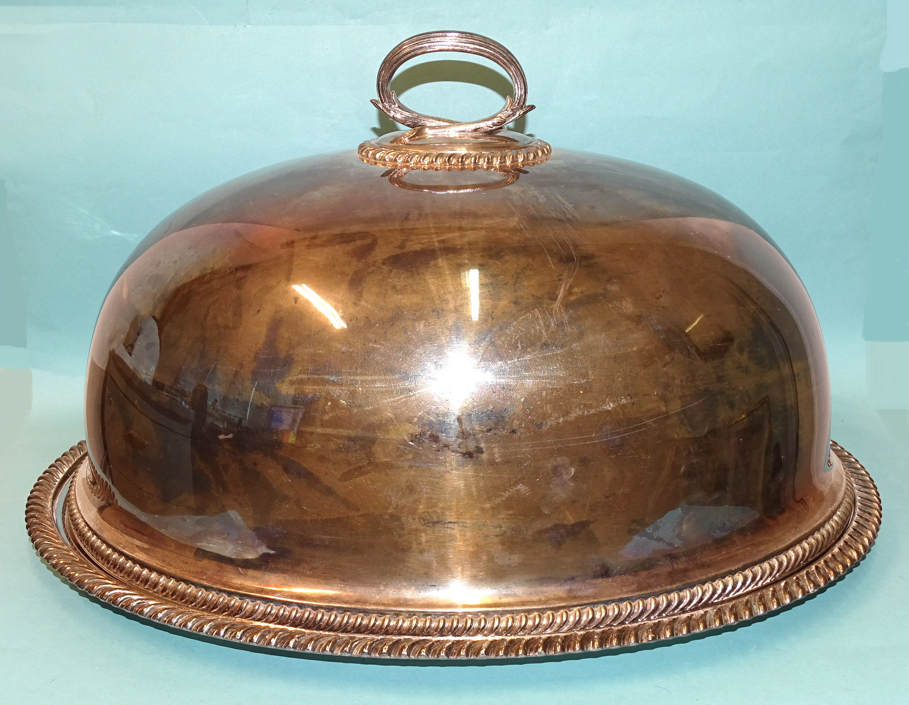 A large silver-plated meat dish and dome by Mappin & Webb, dish 50 x 40cm, dome 26cm high.