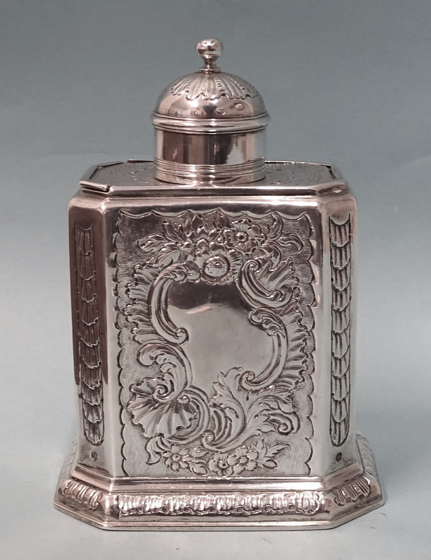 A George I silver tea caddy of upright rectangular form, with canted corners and later Rococo - Image 3 of 7