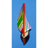 Léa Stein, Paris, a sailboat brooch pin c1970’s with rainbow-coloured sails and black, red and cream