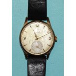 Omega, a gentleman's 9ct-gold-cased wristwatch c1950's, the silvered dial with Arabic 3, 9, 12,