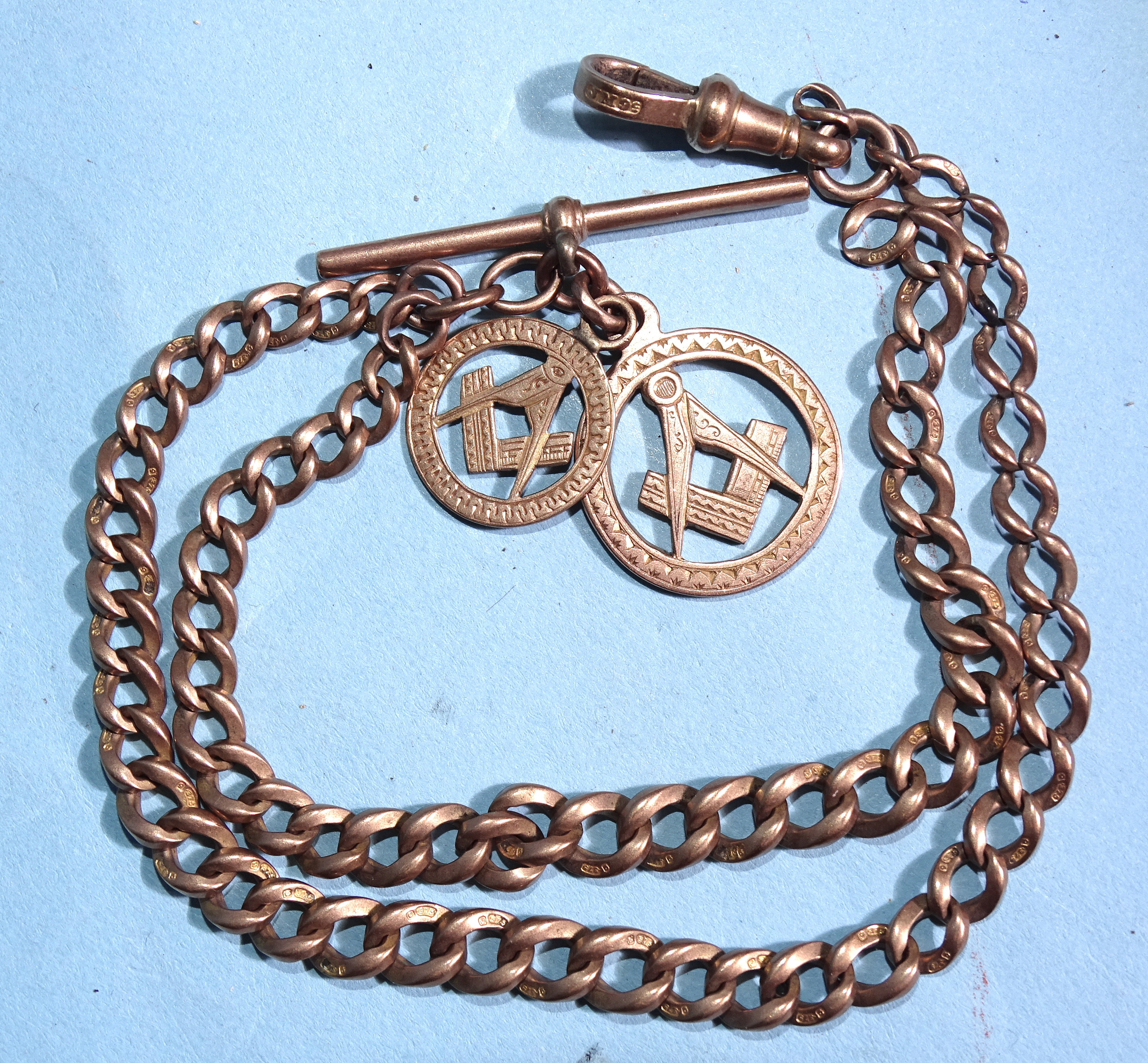 A 9ct rose gold Albert watch chain with two Masonic medallions, 30g.