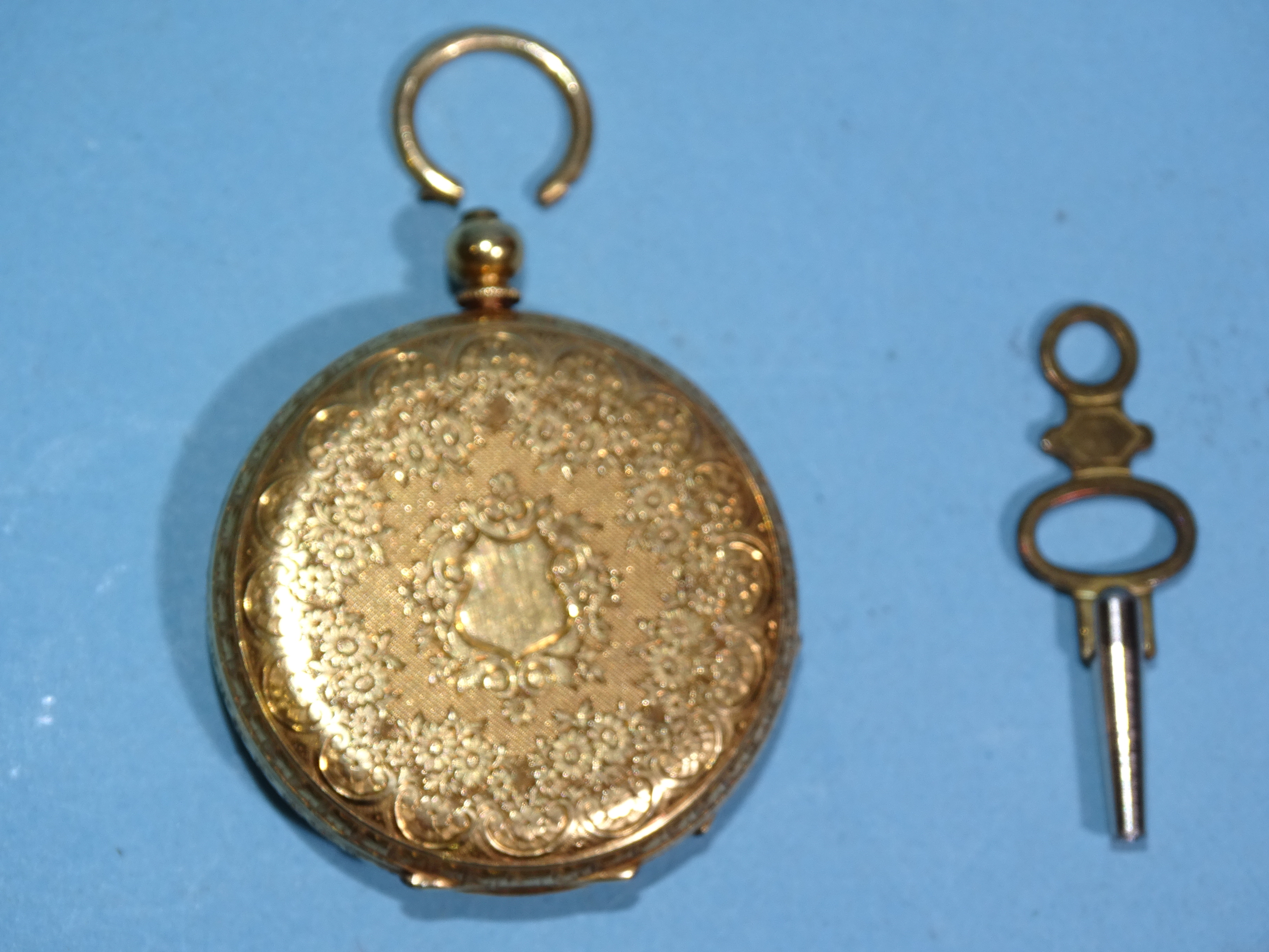 A lady's 18ct-gold-cased key-wind pocket watch, the engraved gold dial with Roman numerals, with