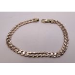 A 9ct gold curb-link bracelet, 20cm long, 10.3g.