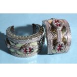 A pair of Turkoman bracelets of yellow and white metal, (tested as having gold and silver