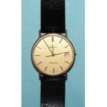 Hermes, a gentleman's 9ct gold-cased 'Quartz' wristwatch, the gilt face with baton numerals and date