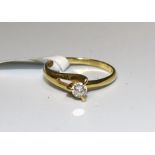 A solitaire diamond ring claw-set a brilliant-cut diamond of approximately 0.2cts, in 18ct gold