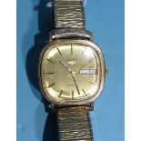 Rotary, a 9ct-gold-cased quartz gent's wrist watch, 1980, with gilt dial day/date aperture, baton