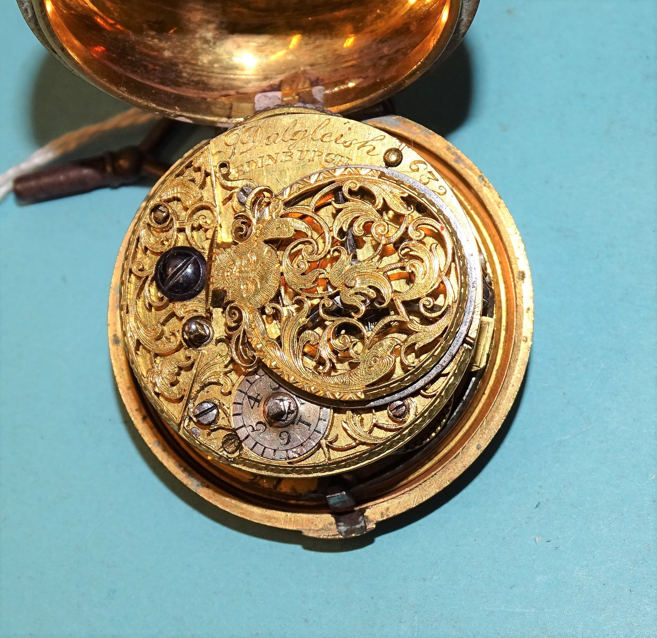 J Dalgleish, an 18th century gilt metal and leather-covered pair-cased verge pocket watch signed J