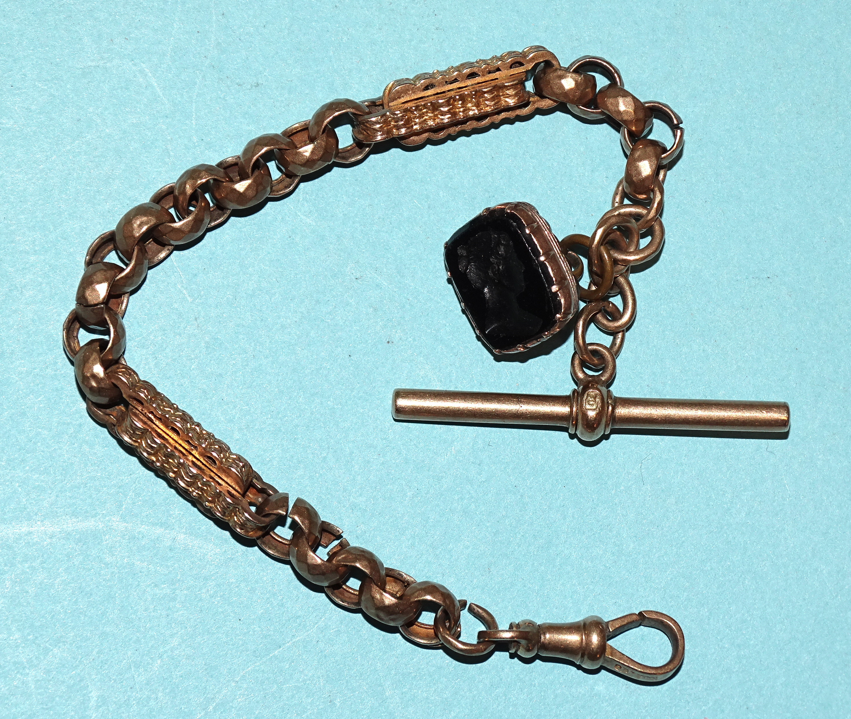 A Victorian 9ct gold fancy-link short watch chain with plated fob, 17cm long, gross weight 13.7g.