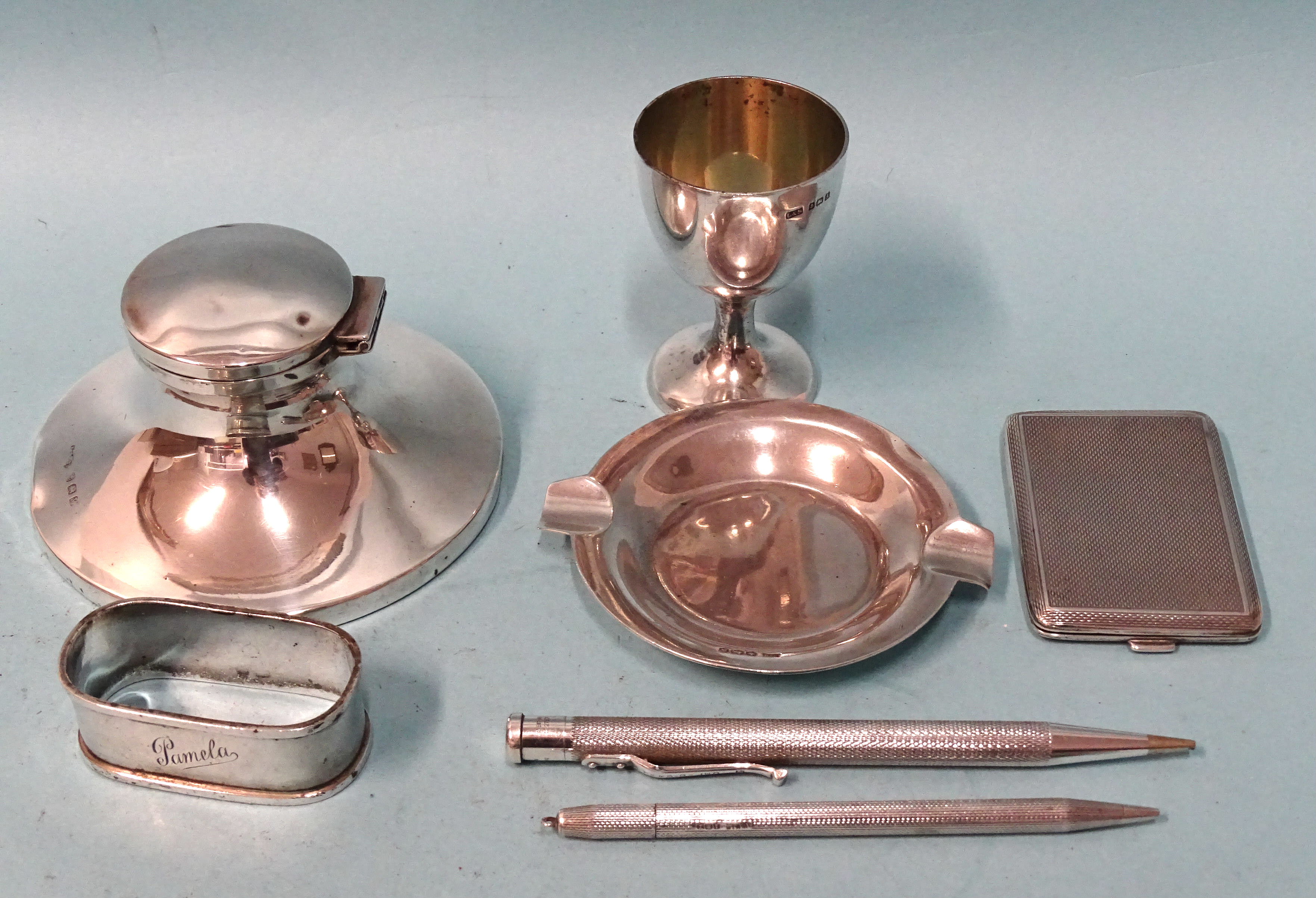 A silver capstan inkwell, (dented), 9.5cm diameter, Birmingham 192*, a silver egg cup, Birmingham - Image 2 of 2