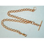 An 18ct gold Albert watch chain of curb links, with T-bar and one shackle, 41cm, 54g.