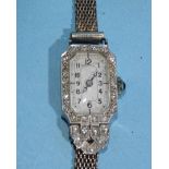 A lady's Art Deco diamond-set manual wrist watch, the platinum octagonal case set twenty-five 8/8-