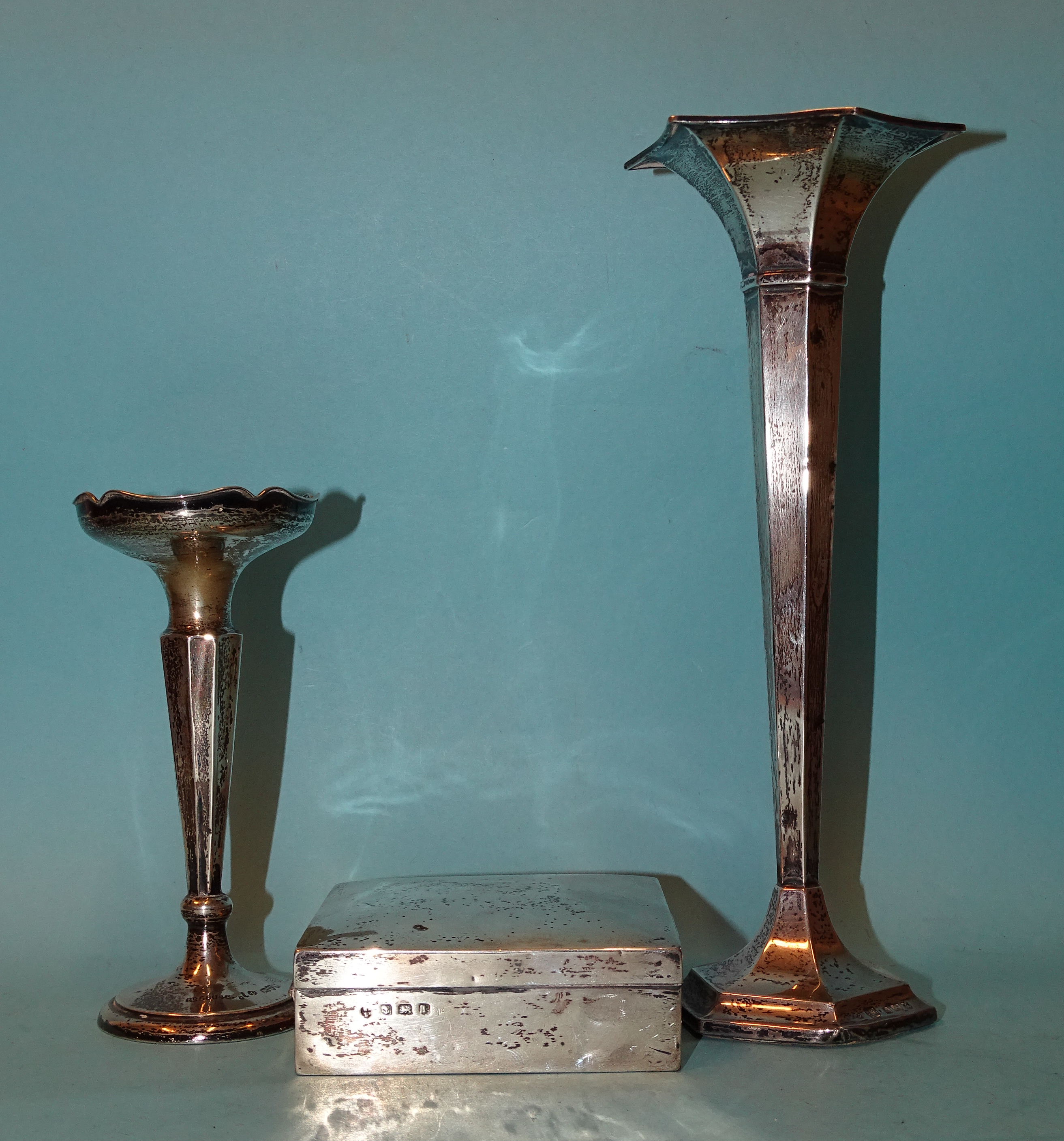 A silver spill vase of hexagonal form, Birmingham 1922, another, smaller, Chester 1912 and a - Image 2 of 2