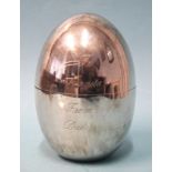 A silver box in the form of an egg, (engraved inscription), Alfred Dunhill & Sons, London 1974, 11cm