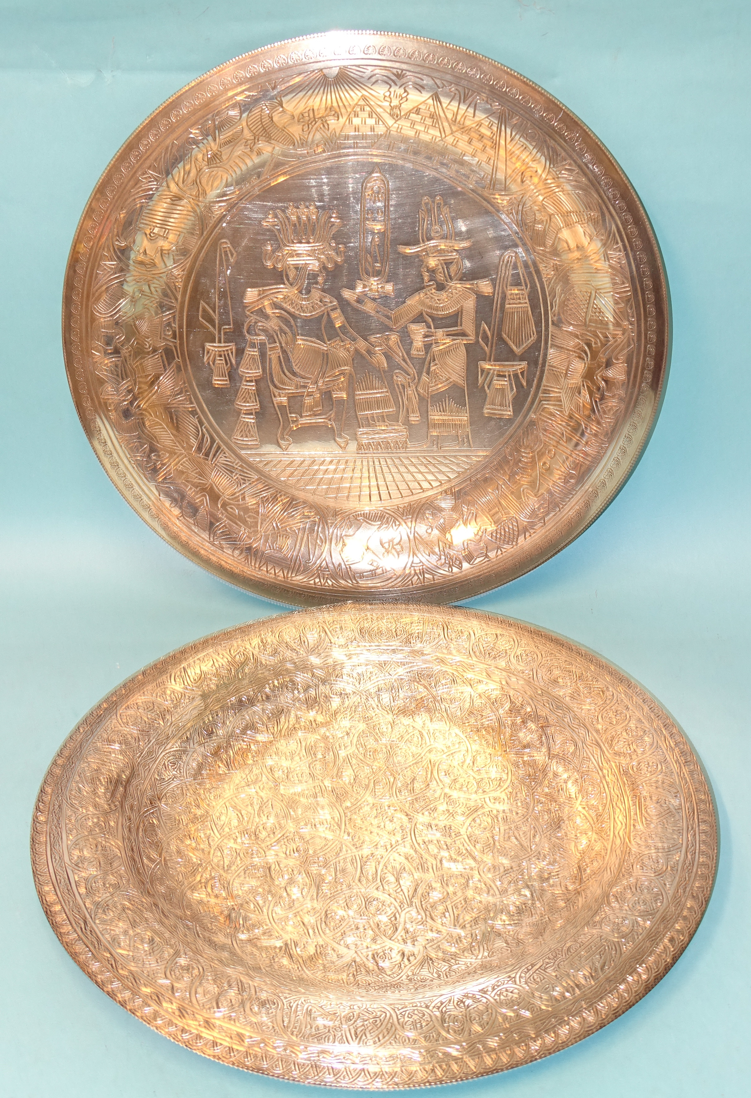 A large decorative white metal dish bearing Egyptian stamped marks, 30cm diameter, ___17oz and