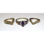 A 9ct gold amethyst and diamond ring, size U½, 2.4g and two 9ct gold wishbone rings, 2.3g, (3).