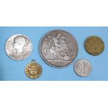 A Victoria 1890 crown, an 1897 Jubilee medallion and three other coins.